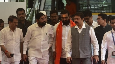 Maharashtra chief minister Eknath Shinde with MLA Santosh Bangar (in saffron scarf). Maharashtra chief minister Eknath Shinde with MLA Santosh Bangar (in saffron scarf).