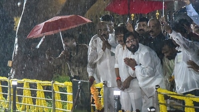 Amid rain, Maharashtra chief minister Eknath Shinde pays tribute to Bal Thackeray at the Bal Thackeray Smruti Sthal, at Shivaji Park. (PTI) Amid rain, Maharashtra chief minister Eknath Shinde pays tribute to Bal Thackeray at the Bal Thackeray Smruti Sthal, at Shivaji Park. (PTI)