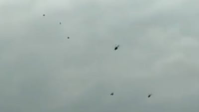 In the screengrab of the video, black balloons could be seen flying close to PM Modi's chopper.