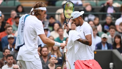 Australia's Nick Kyrgios (R) and Greece's Stefanos Tsitsipas Australia's Nick Kyrgios (R) and Greece's Stefanos Tsitsipas