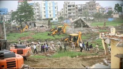 At the demolition site at Nepali Nagar in Patna on Monday. (Santosh Kumar/HT Photo) At the demolition site at Nepali Nagar in Patna on Monday. (Santosh Kumar/HT Photo)