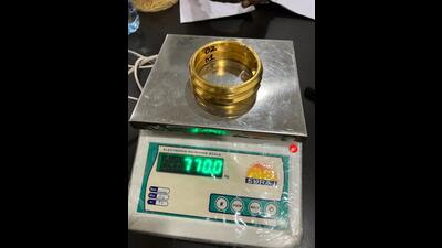 The two 24-carat gold bangles, weighed 770 gm in all. The passenger was wearing them on her upper arms, hidden under shirt sleeves. (HT Photo)
