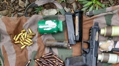The recoveries included six sticky bombs, a pistol, three pistol magazines ( two for Glock pistols and one for 30 bore pistols), one under-barrel grenade launcher (UBGL), three UBGL grenades, 75 AK rounds, 15 rounds of a Glock pistol, four rounds of 30 bore pistol, and an improvised explosive device (IED) with a remote. (Representative Image/HT File) The recoveries included six sticky bombs, a pistol, three pistol magazines ( two for Glock pistols and one for 30 bore pistols), one under-barrel grenade launcher (UBGL), three UBGL grenades, 75 AK rounds, 15 rounds of a Glock pistol, four rounds of 30 bore pistol, and an improvised explosive device (IED) with a remote. (Representative Image/HT File)