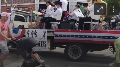 A Fourth of July parade-goer runs for cover after gunfire was heard at the parade Monday morning, in a suburb of Chicago. (AP) A Fourth of July parade-goer runs for cover after gunfire was heard at the parade Monday morning, in a suburb of Chicago. (AP)