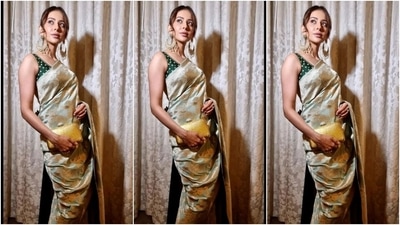 On Monday, Rakul dropped several pictures from the photoshoot she did wearing the silk number and captioned it, "Desi at heart." Her ensemble is from the shelves of clothing label Ahikoza, known for its artisanally crafted pieces. Additionally, celebrity stylist Anshika Verma styled Rakul's look. (Instagram) On Monday, Rakul dropped several pictures from the photoshoot she did wearing the silk number and captioned it, "Desi at heart." Her ensemble is from the shelves of clothing label Ahikoza, known for its artisanally crafted pieces. Additionally, celebrity stylist Anshika Verma styled Rakul's look. (Instagram)