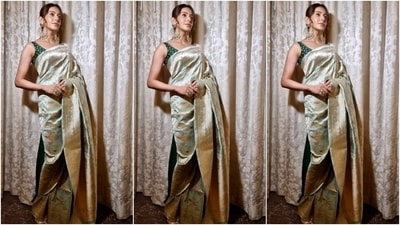Rakul chose a mint green silk drape adorned with intricate brocade embroidery and broad borders in a golden hue. The star wore the six yards in traditional style, allowing the pallu to fall from her shoulder. Lastly, a dark green sleeveless blouse, replete with elegant gold brocade embroidered, rounded off the ensemble. (Instagram) Rakul chose a mint green silk drape adorned with intricate brocade embroidery and broad borders in a golden hue. The star wore the six yards in traditional style, allowing the pallu to fall from her shoulder. Lastly, a dark green sleeveless blouse, replete with elegant gold brocade embroidered, rounded off the ensemble. (Instagram)