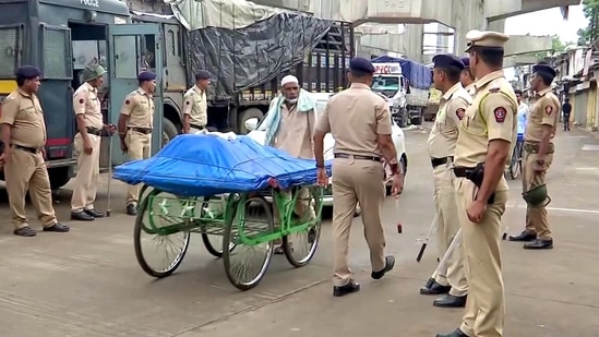 Police personnel keep vigil ahead of 'Shradhanjali Sabha' of Umesh Kolhe, who was killed for alleged social media post backing Nupur Sharma on June 21, in Amravati on Monday.(ANI)