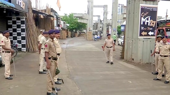 Police personnel keep vigil ahead of 'Shradhanjali Sabha' of Umesh Kolhe who was killed for alleged social media post backing Nupur Sharma on June 21, in Amravati.(ANI)