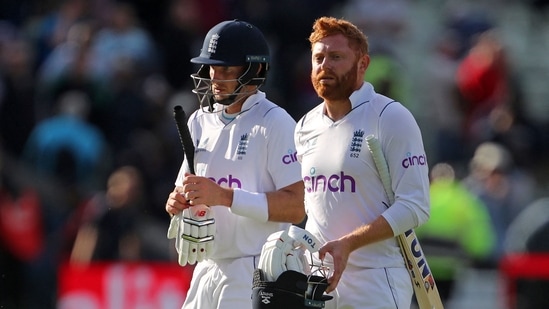 Joe Root and Jonny Bairstow walk back after the fourth day's play, (AP)