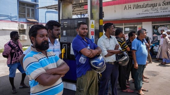 People wait to buy fuel at a fuel station in Colombo, Sri Lanka, June 27, 2022.(AP)
