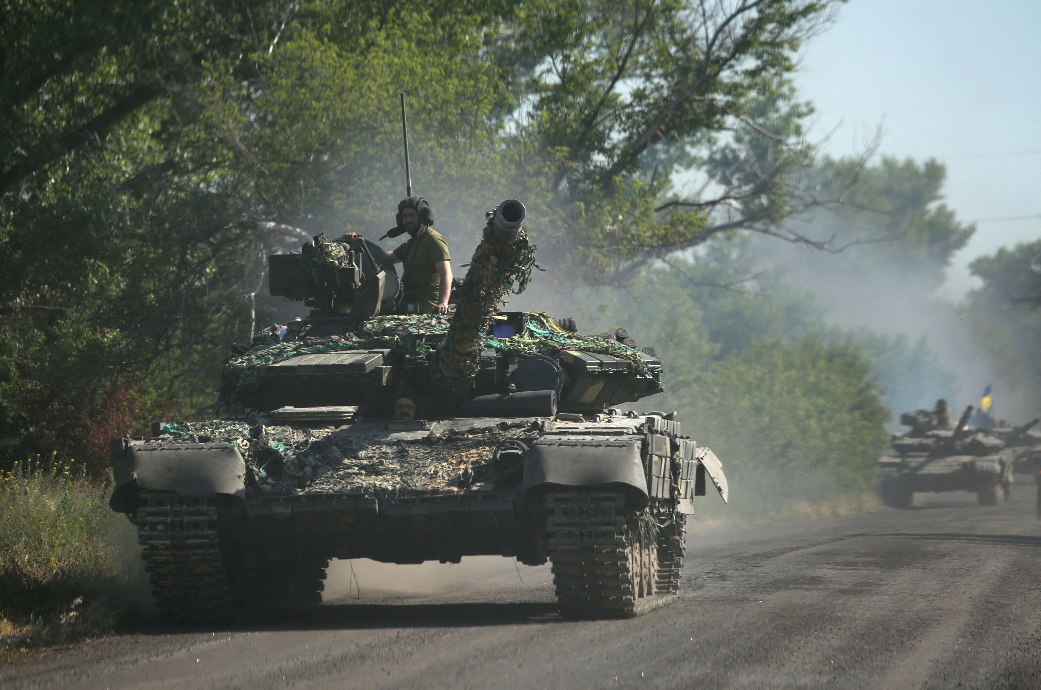 Ukrainian troop move by tanks on a road of the eastern Ukrainian region of Donbas on June 21, 2022. (AFP file photo) Ukrainian troop move by tanks on a road of the eastern Ukrainian region of Donbas on June 21, 2022. (AFP file photo)
