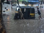 The heavy rain created major inconvenience for commuters.(Praful Gangurde / HT Photo)