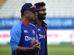 India's Jasprit Bumrah, right, and coach Rahul Dravid(AP)