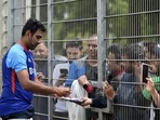 R Ashwin signs autographs for fans in Birmingham(AP) R Ashwin signs autographs for fans in Birmingham(AP)
