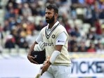 India's Cheteshwar Pujara leaves the field after losing his wicket during the fourth day of the fifth cricket test match between England and India at Edgbaston in Birmingham.(AP)