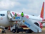 Dubai-bound SpiceJet Boeing 737 Max aircraft after its landing following a fuel indicator malfunction, at Karachi Airport. (PTI Photo) Dubai-bound SpiceJet Boeing 737 Max aircraft after its landing following a fuel indicator malfunction, at Karachi Airport. (PTI Photo)