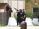 At least six people were killed and around 30 wounded on July 4 when a gunman opened fire from a rooftop at a Fourth of July parade in the Chicago suburb of Highland Park.(AFP)