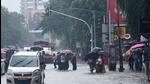 Mumbai, India - July 05, 2022 : Vehicles slow Moving and People walk in a Waterlogging on S V Road at Vile Parle West, in Mumbai, India, on Tuesday. (Vijay Bate/HT Photo) Mumbai, India - July 05, 2022 : Vehicles slow Moving and People walk in a Waterlogging on S V Road at Vile Parle West, in Mumbai, India, on Tuesday. (Vijay Bate/HT Photo)