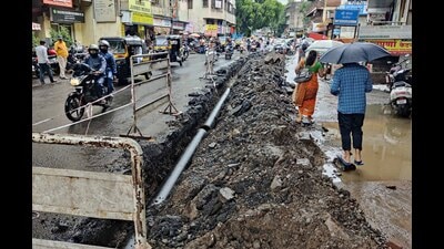 Road digging underway at Narpatgiri chowk on Tuesday. (Rahul Raut/HT PHOTO) Road digging underway at Narpatgiri chowk on Tuesday. (Rahul Raut/HT PHOTO)