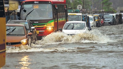 Vehicles wade through waterlogged road due to incessant rain since morning at Kurla on Tuesday. (Satish Bate/HT PHOTO) Vehicles wade through waterlogged road due to incessant rain since morning at Kurla on Tuesday. (Satish Bate/HT PHOTO)