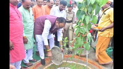 UP Deputy CM Brajesh Pathak at the tree plantation event at Kanihar lake in Jhunsi at Prayagraj on Tuesday. (HT) UP Deputy CM Brajesh Pathak at the tree plantation event at Kanihar lake in Jhunsi at Prayagraj on Tuesday. (HT)