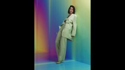 Mumbai-based VI Kyra in an oversized tea green suit for one of her fashion shoots (Instagram) Mumbai-based VI Kyra in an oversized tea green suit for one of her fashion shoots (Instagram)