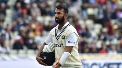 India's Cheteshwar Pujara leaves the field after losing his wicket during the fourth day of the fifth cricket test match between England and India at Edgbaston in Birmingham. (AP) India's Cheteshwar Pujara leaves the field after losing his wicket during the fourth day of the fifth cricket test match between England and India at Edgbaston in Birmingham. (AP)