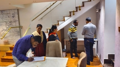 Raids by the Anti-Corruption Bureau (ACB) underway at Congress MLA BZ Zameer Ahmed Khan's guest house in Sadashiva Nagar, Bengaluru. (ANI)