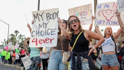Abortion rights protesters chant during a Pro Choice rally at the Tucson Federal Courthouse in Tucson, Arizona. (AFP) Abortion rights protesters chant during a Pro Choice rally at the Tucson Federal Courthouse in Tucson, Arizona. (AFP)