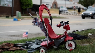 “It definitely hits a lot harder when it’s not only your hometown but it’s also right in front of you,” resident Ron Tuazon said as he and a friend returned to the parade route Monday evening to retrieve chairs, blankets and a child’s bike that he and his family abandoned when the shooting began. (REUTERS)