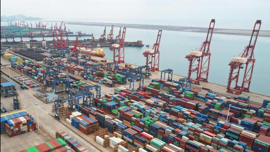 Cargo containers stacked at a port in Lianyungang in China’s eastern Jiangsu province. (AFP)