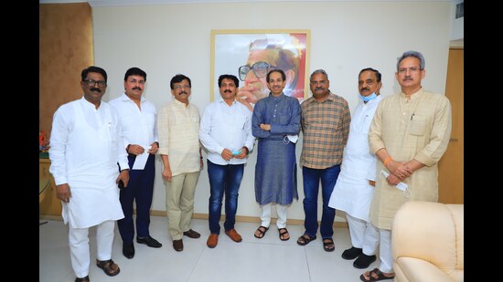 Shivajirao Adhalrao Patil (third from right) met Uddhav Thackeray in Mumbai on Tuesday. (HT PHOTO)