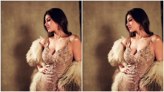 Mouni Roy earlier set the internet on fire with her ball room look in a shimmery rosegold figure-grasping gown teamed with a fur stole.(Instagram/@imouniroy)