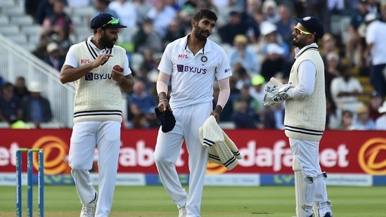 India's captain Jasprit Bumrah, center, interacts with teammates Rishabh Pant, right, and Mohammed Shami during the fourth day of the fifth cricket test match between England and India at Edgbaston in Birmingham, England(AP)