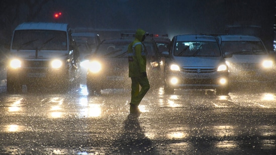 Vehicles ply on a road amid monsoon rains.(PTI) Vehicles ply on a road amid monsoon rains.(PTI)