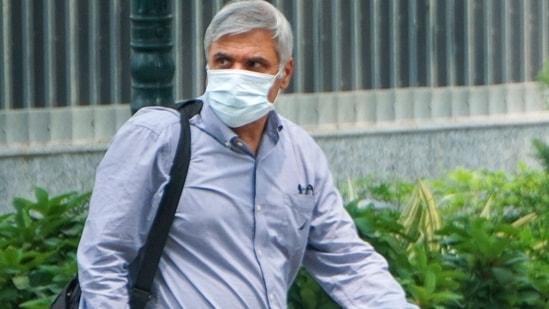 Former Mumbai Police Commissioner Sanjay Pandey arrives at the ED's office for questioning in the NSE co-location scam, in New Delhi on Tuesday.(PTI) Former Mumbai Police Commissioner Sanjay Pandey arrives at the ED's office for questioning in the NSE co-location scam, in New Delhi on Tuesday.(PTI)