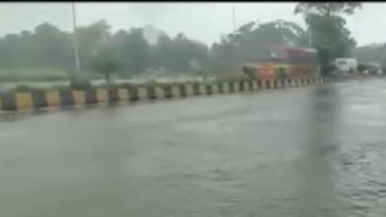A heavily inundated road in Sion. (ANI)