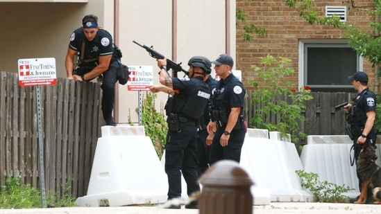 At least six people were killed and around 30 wounded on July 4 when a gunman opened fire from a rooftop at a Fourth of July parade in the Chicago suburb of Highland Park.(AFP)