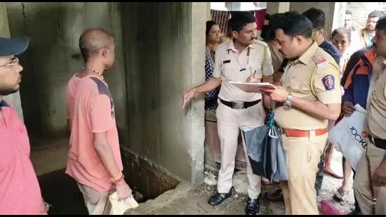 Dombivli Manpada police making enquiries at the spot where a six-year-old boy fell in a lift shaft filled with water and was found dead on Tuesday. (PRAMOD TAMBE/HT PHOTO)