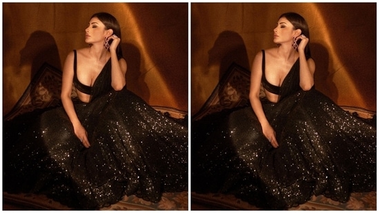 Mouni Roy earlier turned muse for Indian fashion designer Sawan Gandhi and served justice to the gorgeous black contemporary lehenga set.(Instagram/@imouniroy)