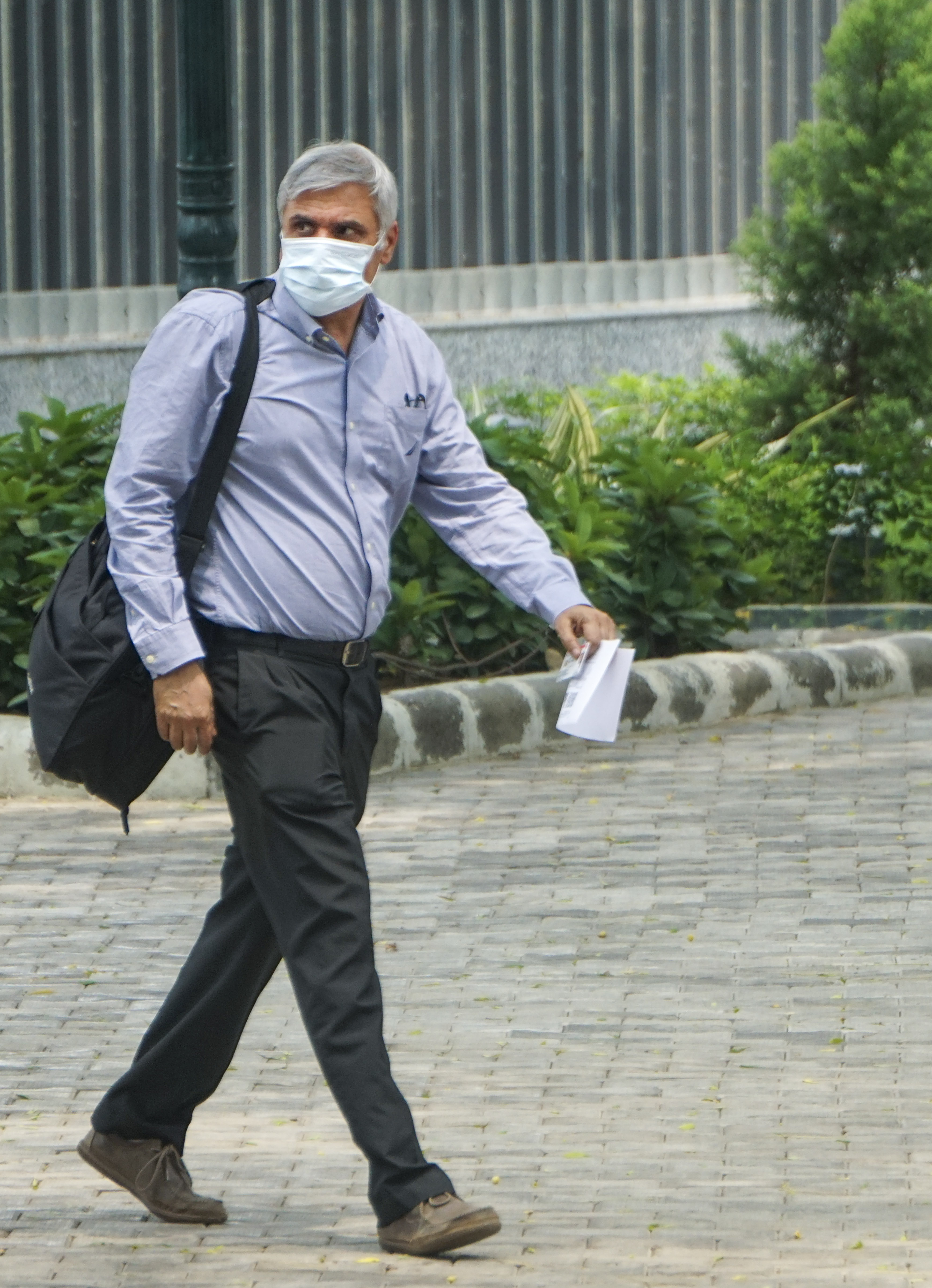 Former Mumbai Police Commissioner Sanjay Pandey arrives at the ED's office for questioning in the NSE co-location scam, in New Delhi on Tuesday. (PTI) Former Mumbai Police Commissioner Sanjay Pandey arrives at the ED's office for questioning in the NSE co-location scam, in New Delhi on Tuesday. (PTI)