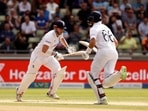 England's Alex Lees runs with Joe Root