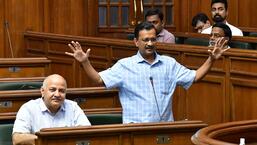 Delhi chief minister Arvind Kejriwal (right) with deputy CM Manish Sisodia in the state assembly on Tuesday. (HT Photo)