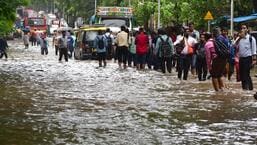 Mumbai, India - July 06, 2022: Vehicles and people wade through a waterlogged street as heavy rain batters the city continuously for the third day, at Dadar, in Mumbai, India, on Wednesday, July 06, 2022. Photo by Bhushan Koyande/HT Photo) (HT PHOTO)