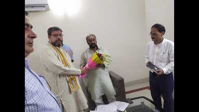 UP higher education Minister Yogendra Upadhyay with Sampurnanand Sanskrit University vice-chancellor Prof Hareram Tripathi in Varanasi on Wednesday. (HT Photo)