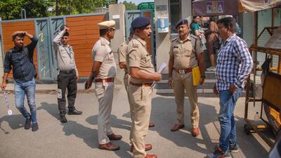 Chhattisgarh Police personnel give a notice to the local police in the Sector 20 police station regarding the arrest of Zee News anchor Rohit Ranjan, in Noida on Wednesday. (PTI) Chhattisgarh Police personnel give a notice to the local police in the Sector 20 police station regarding the arrest of Zee News anchor Rohit Ranjan, in Noida on Wednesday. (PTI)