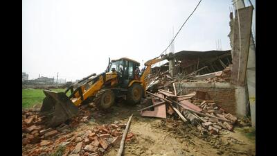 Demolition drive at Nepali Nagar on Sunday. (Santosh Kumar/HT Photo) Demolition drive at Nepali Nagar on Sunday. (Santosh Kumar/HT Photo)
