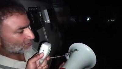 A parent requests his to drop weapons and surrender, during an encounter at Hadigam area of Kulgam, Kashmir. (ANI) A parent requests his to drop weapons and surrender, during an encounter at Hadigam area of Kulgam, Kashmir. (ANI)