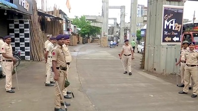 Police personnel keep vigil ahead of 'Shradhanjali Sabha' of Umesh Kolhe who was killed for alleged social media post backing Nupur Sharma in Amravati. (ANI) Police personnel keep vigil ahead of 'Shradhanjali Sabha' of Umesh Kolhe who was killed for alleged social media post backing Nupur Sharma in Amravati. (ANI)