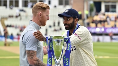 England's captain Ben Stokes, left, and India's captain Jasprit Bumrah shake hands after receiving the winners trophy after England won the fifth cricket test match at Edgbaston in Birmingham. (AP) England's captain Ben Stokes, left, and India's captain Jasprit Bumrah shake hands after receiving the winners trophy after England won the fifth cricket test match at Edgbaston in Birmingham. (AP)